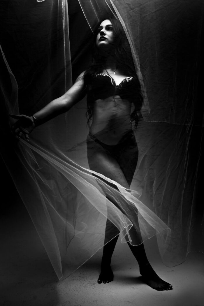 Boudoir con velo in movimento